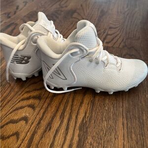 Never worn New Balance Freeze- Kids size 4